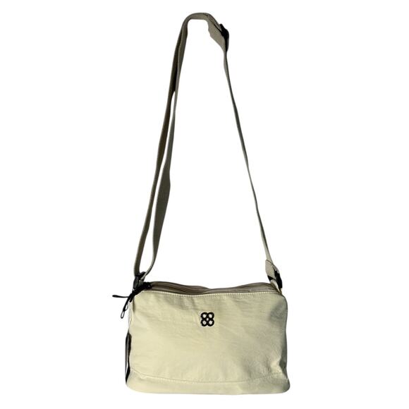 Eslcorri Handbags - NEW Cream Nylon Crossbody Travel Bag Lightweight Multi Pocket Shoulder Purse